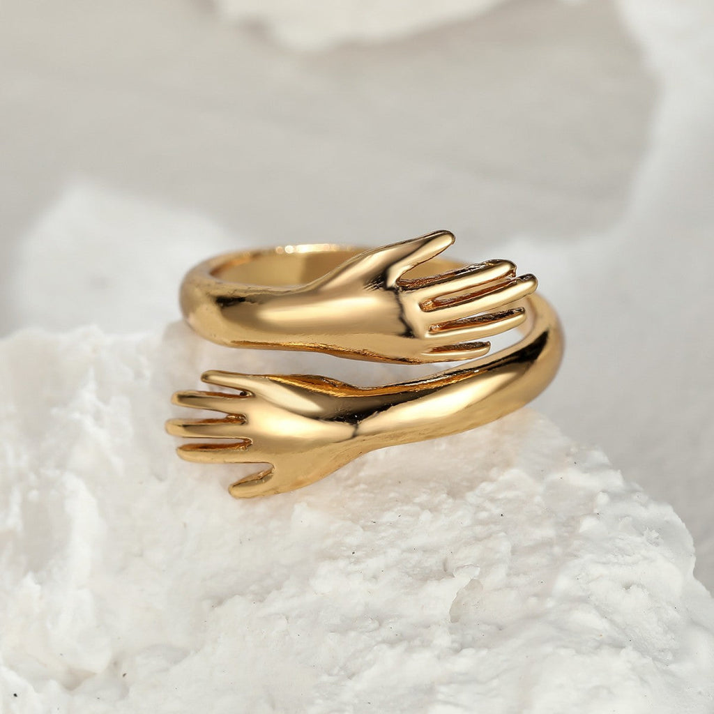 Couples Rings With Palms Spread Wide